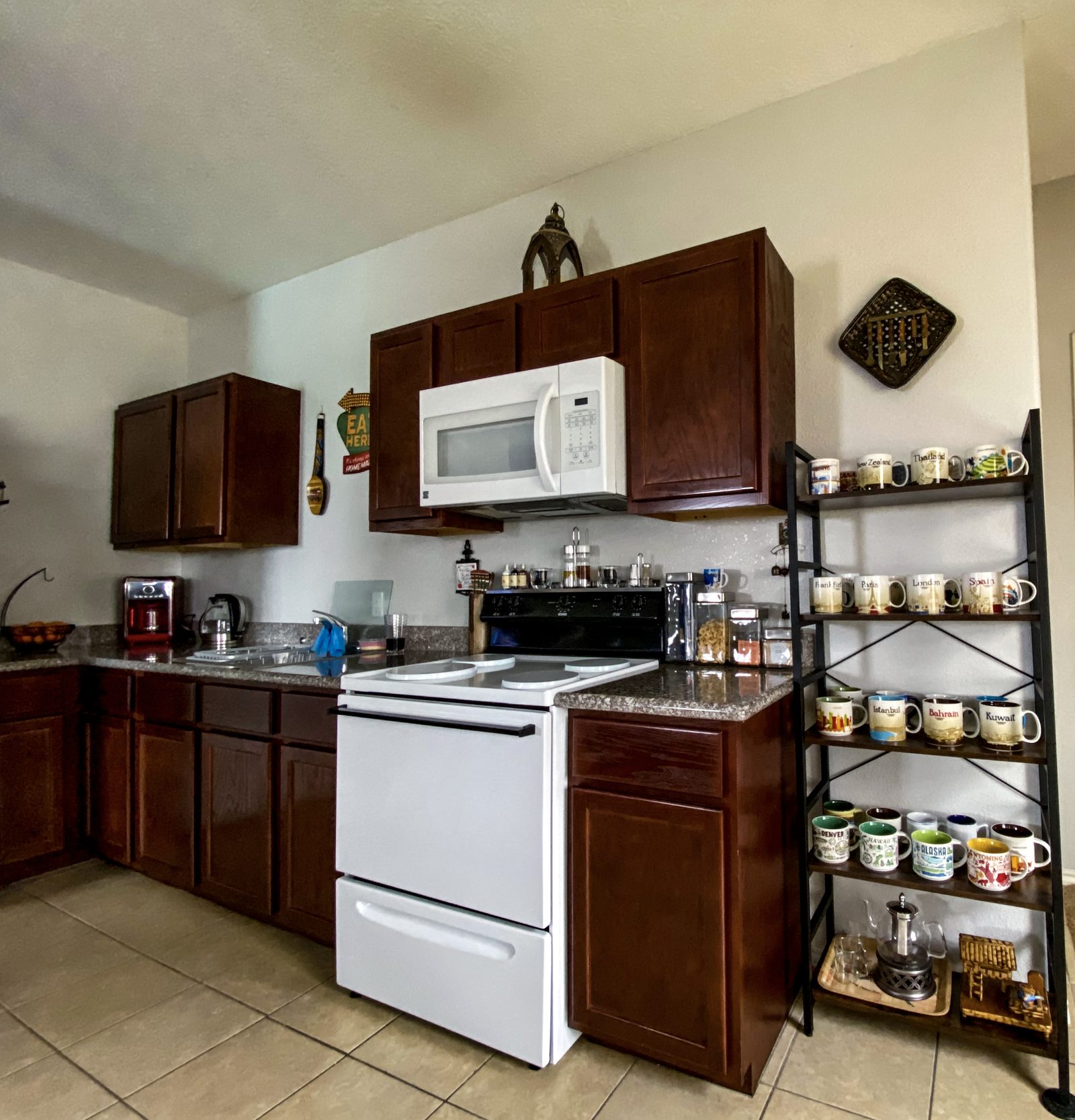 Kitchen inside a furnished UAG apartment