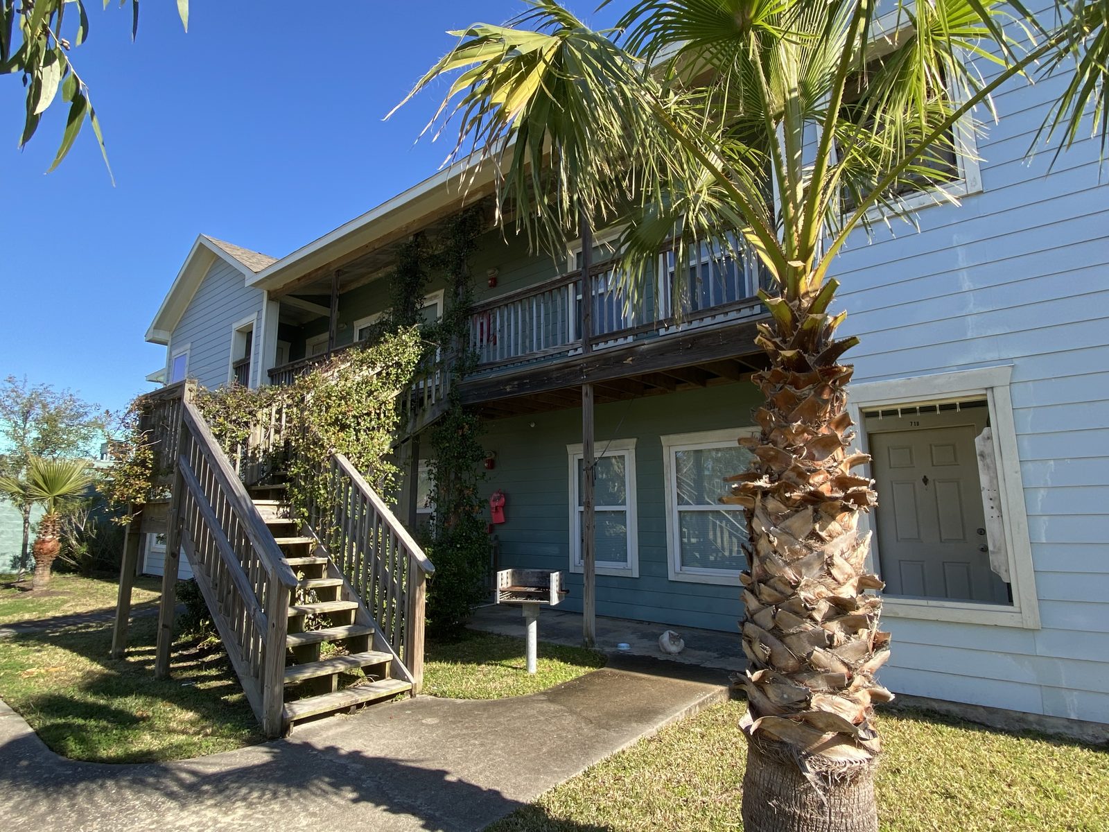 Exterior walkway and stairs at a UAG apartment building