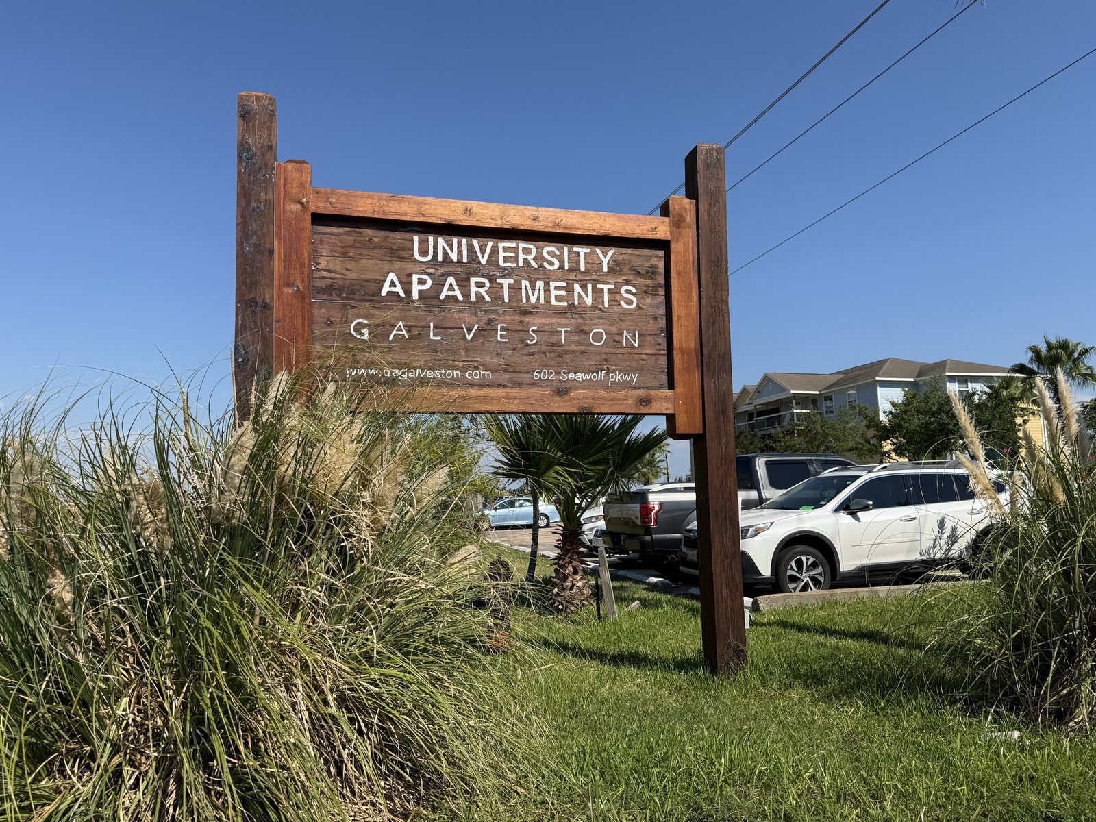 University Apartments Galveston entrance sign